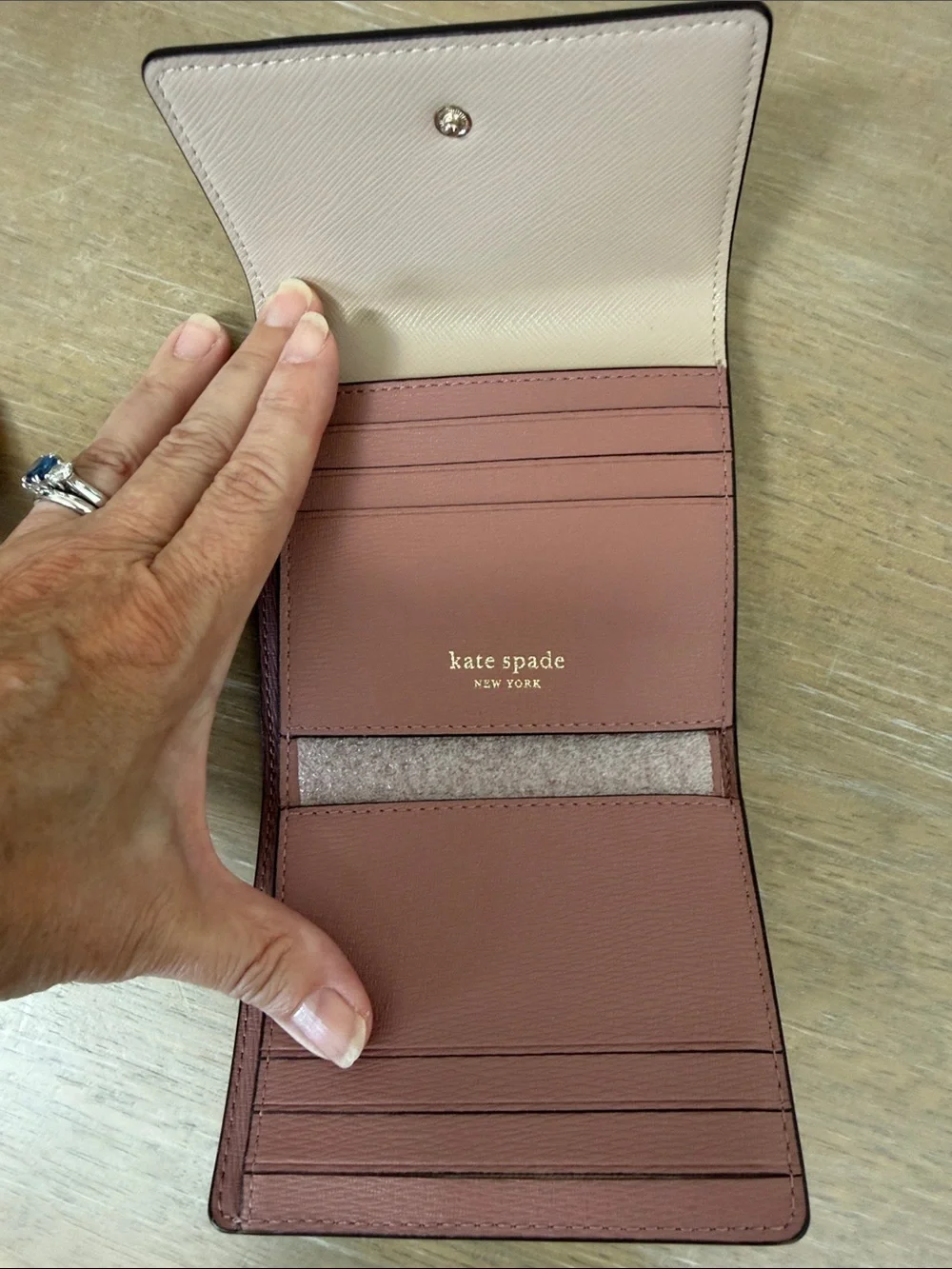Kate Spade NWT Mila trifold flap wallet in Warm Beige saffiano leather